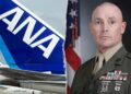 Marine restrains man who tried to open emergency exit on flight: report