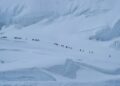Climbers battle in opposition to the climate on Mount Everest in pictures