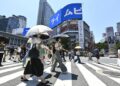 Why has Japan arrange a job pressure to cope with foreigners?
