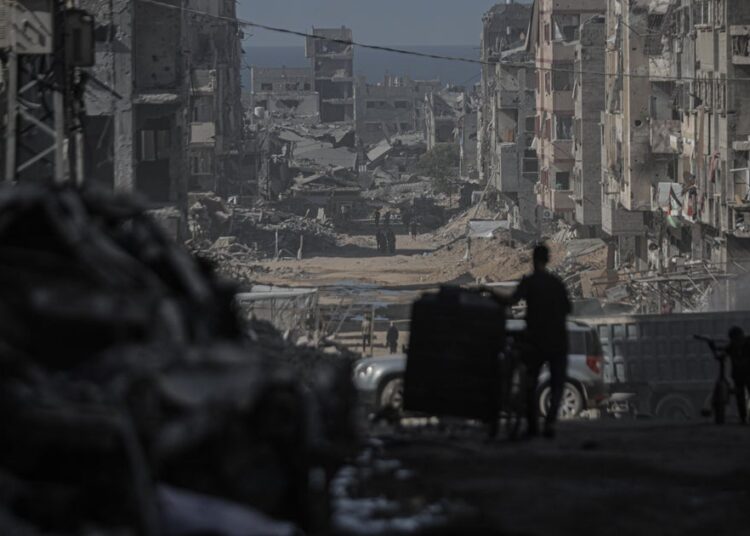 Israel calls Hamas’ return of partial stays of beforehand recovered hostage “clear violation” of peace deal