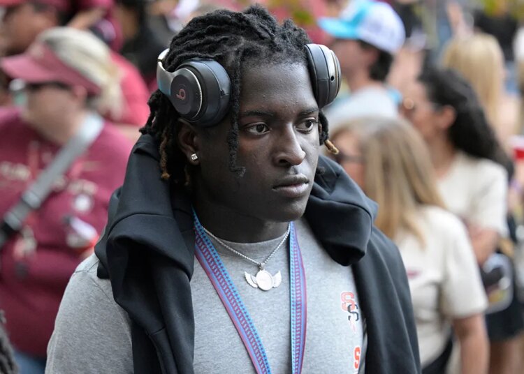 FSU soccer participant Ethan Pritchard reunites with group after taking pictures