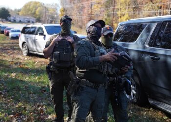 Officer injured as van rams automobiles amid Charlotte immigration raids Officer injured as van rams automobiles amid Charlotte immigration raids