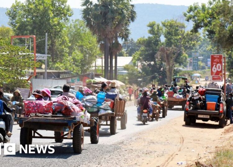 Hundreds flee disputed border after lethal clashes and air strikes