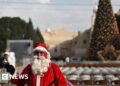Bethlehem Christmas tree lights up for first time since begin of Gaza battle