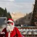 Bethlehem Christmas tree lights up for first time since begin of Gaza battle