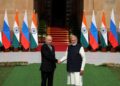 Putin and Modi focus on commerce, peace in New Delhi summit Putin and Modi focus on commerce, peace in New Delhi summit