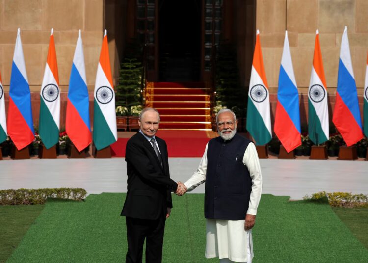 Putin and Modi focus on commerce, peace in New Delhi summit Putin and Modi focus on commerce, peace in New Delhi summit