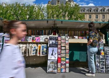 How a 475-year-old guide market within the heart of Paris is surviving in a digital world