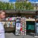 How a 475-year-old guide market within the heart of Paris is surviving in a digital world
