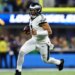 Jalen Hurts throws 4 interceptions as Chargers beat Eagles in extra time