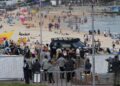 Bondi Seaside taking pictures suspect educated together with his father, police say