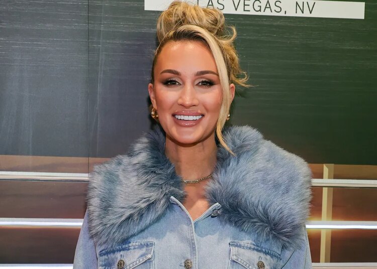 Jason Aldean’s spouse Brittany shares bikini images from seaside journey as followers reward model