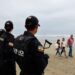 Human heads displayed at Ecuador vacationer seaside in warning to gangs