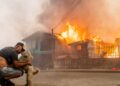 Wildfires race throughout central and southern Chile, leaving 18 lifeless and forcing hundreds to flee