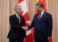Canadian chief Mark Carney visits China to fix financial relations