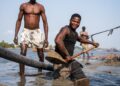 Sand dredging reshapes Lagos, Nigeria, and creates peril