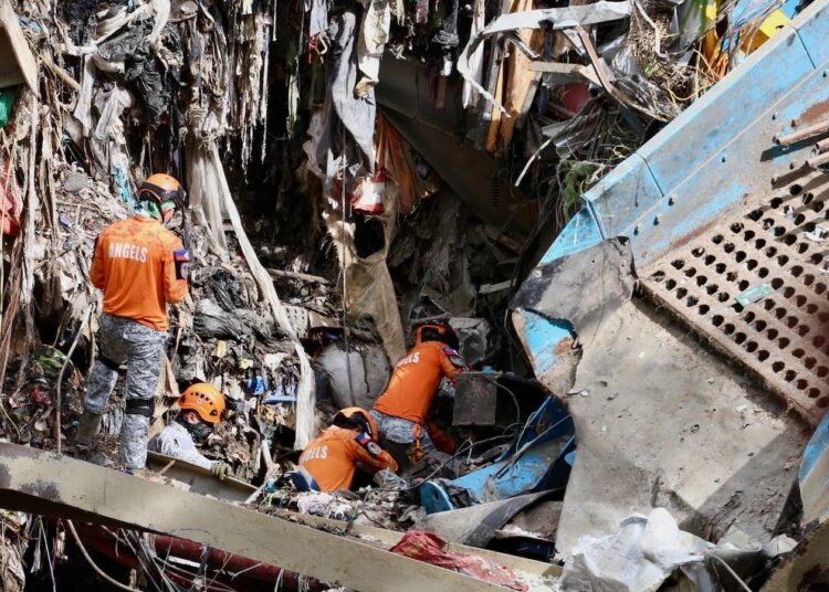 Filipino rescuers detect ‘indicators of life’ in lethal rubbish avalanche; dozens lacking Filipino rescuers detect ‘indicators of life’ in lethal rubbish avalanche; dozens lacking
