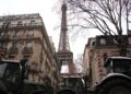 French farmers power their manner by means of Paris with tractors to protest free commerce deal