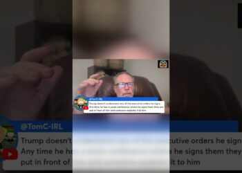 Trump stares blankly whereas signing govt orders