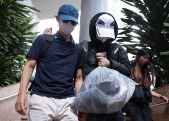 Hong Kong courtroom jails father of US-based democracy activist below nationwide safety regulation Hong Kong courtroom jails father of US-based democracy activist below nationwide safety regulation