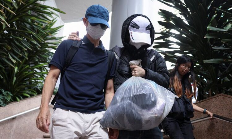 Hong Kong courtroom jails father of US-based democracy activist below nationwide safety regulation