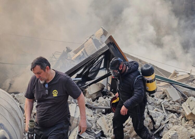 Hezbollah fires on Tel Aviv as Israel threatens Iranian officers in Lebanon