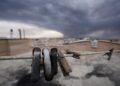 Black clouds over Tehran rain down oil drops after Israel strikes oil services