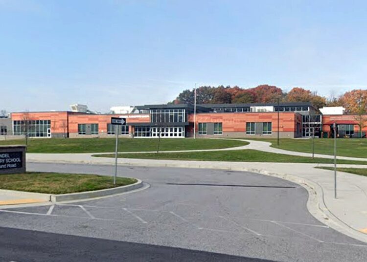 Math trainer discovered useless inside Baltimore elementary college classroom