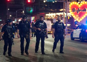 Austin officers face potential grand jury for taking pictures mass gunman