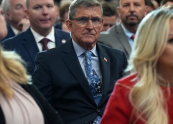 Justice Division reaches monetary settlement with former Trump adviser Michael Flynn