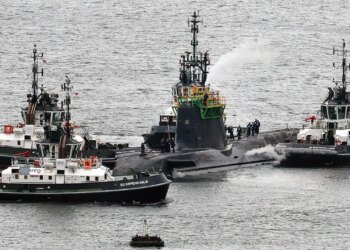 Iranian man, Romanian girl charged over UK nuclear base entry try