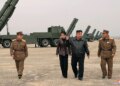 Kim Jong Un watches North Korea weapons check with teenage daughter