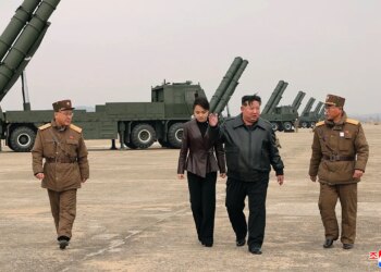 Kim Jong Un watches North Korea weapons check with teenage daughter