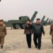 Kim Jong Un watches North Korea weapons check with teenage daughter