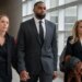 Sherrone Moore and spouse maintain arms in Michigan courtroom
