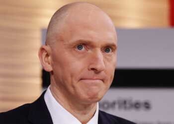 Justice Division settles lawsuit introduced by Trump-Russia probe topic Carter Web page