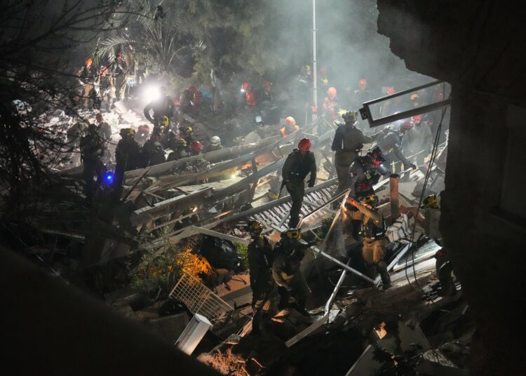 4 injured, 4 feared trapped below rubble in Iranian missile strike on Haifa constructing 4 injured, 4 feared trapped below rubble in Iranian missile strike on Haifa constructing