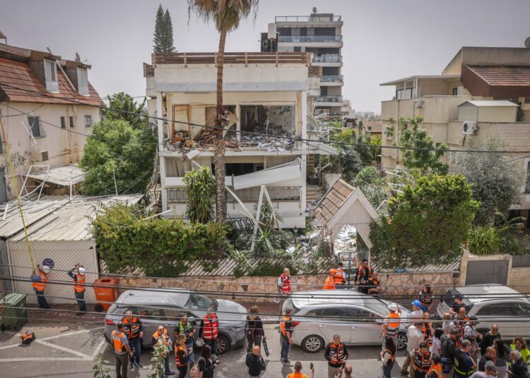 6 wounded as Iran cluster bombs smash houses in central Israel; IDF hits Iran infrastructure 6 wounded as Iran cluster bombs smash houses in central Israel; IDF hits Iran infrastructure