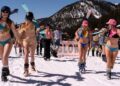 Skiers hit slopes in barely-there bikinis as heat temps soften western resorts’ snow