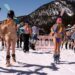 Skiers hit slopes in barely-there bikinis as heat temps soften western resorts’ snow