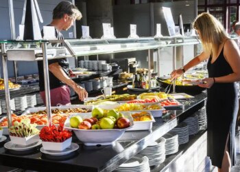 Carnival Cruise Line exams free rooster and waffles lunch on some ships