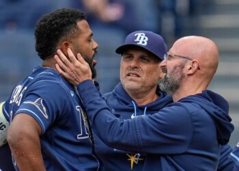 Rays third baseman Junior Caminero exits recreation after foul tip to jaw