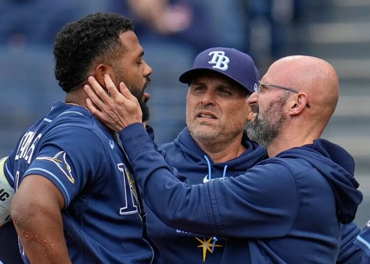 Rays third baseman Junior Caminero exits recreation after foul tip to jaw