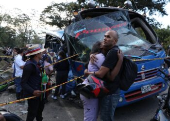 Explosive system kills 13 aboard bus in Colombia as violent assaults persist