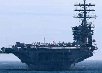 Two US destroyers face ‘sustained’ Iranian assault in Strait of Hormuz