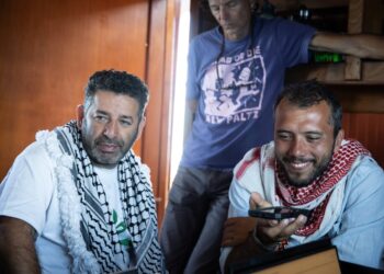 Israel says it is taking 2 flotilla activists again to Israel